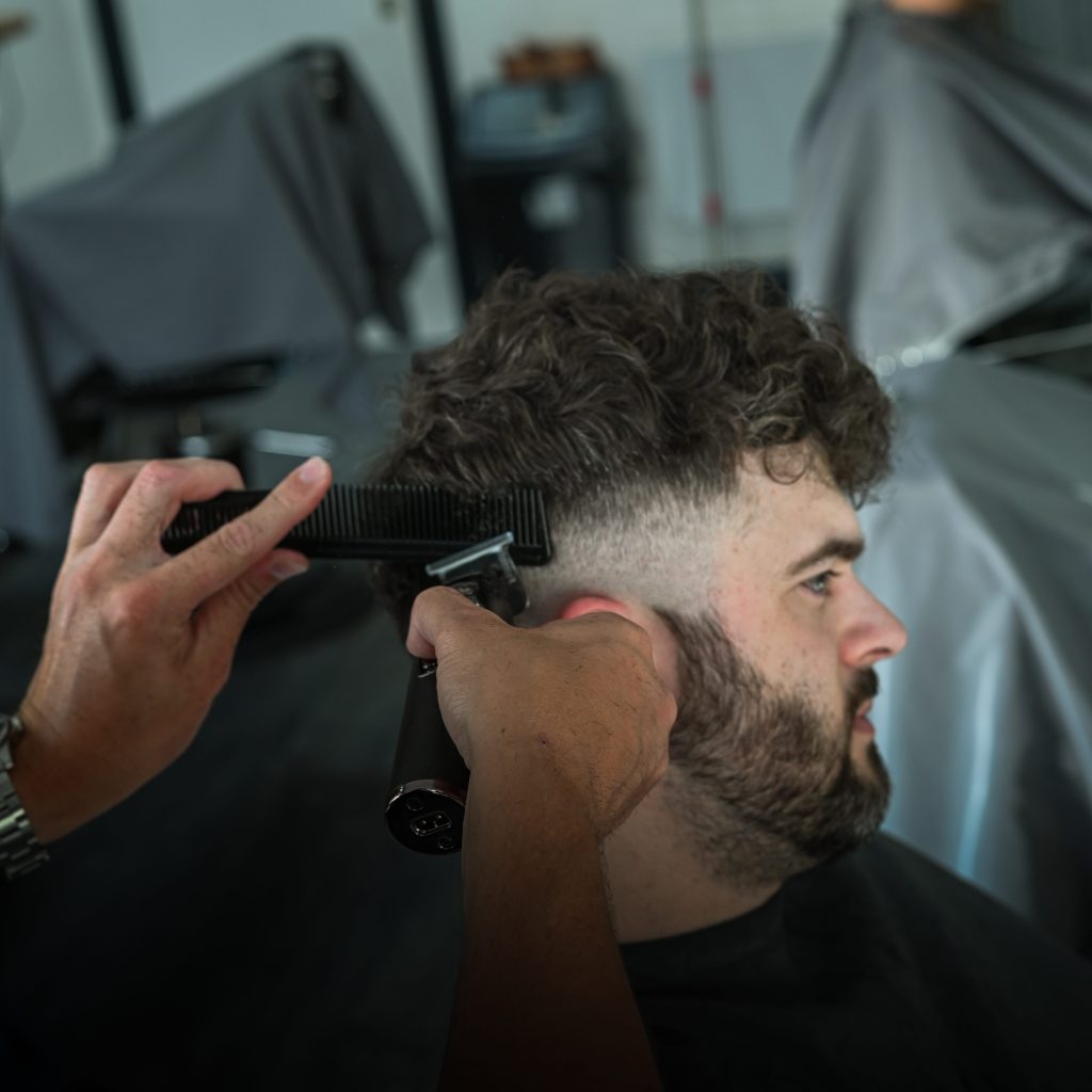 Wombourne Barber giving haircut